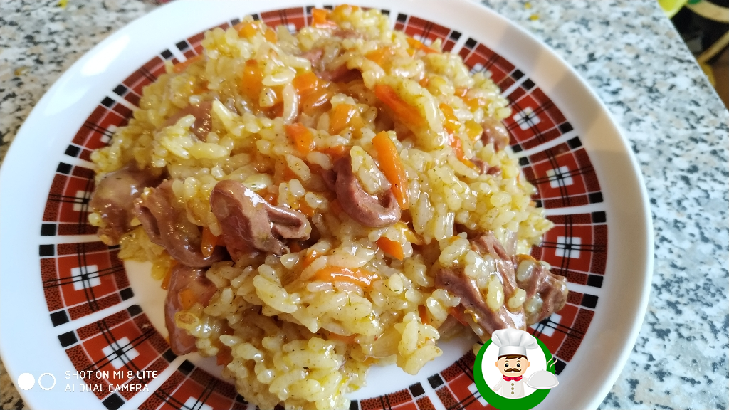 Плов с куриными сердечками